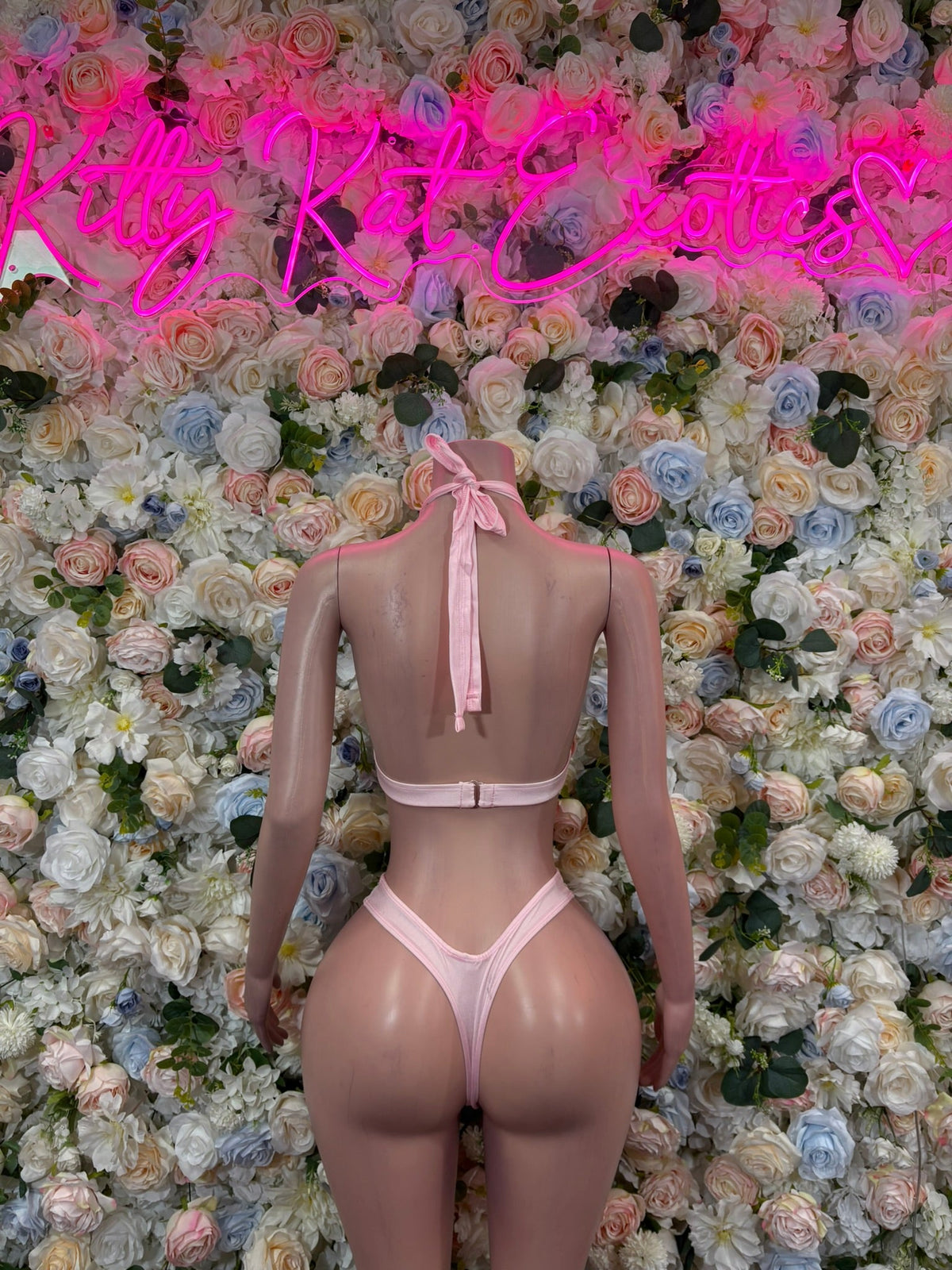 Pink mesh high-neck bikini set shown from back with crisscross straps