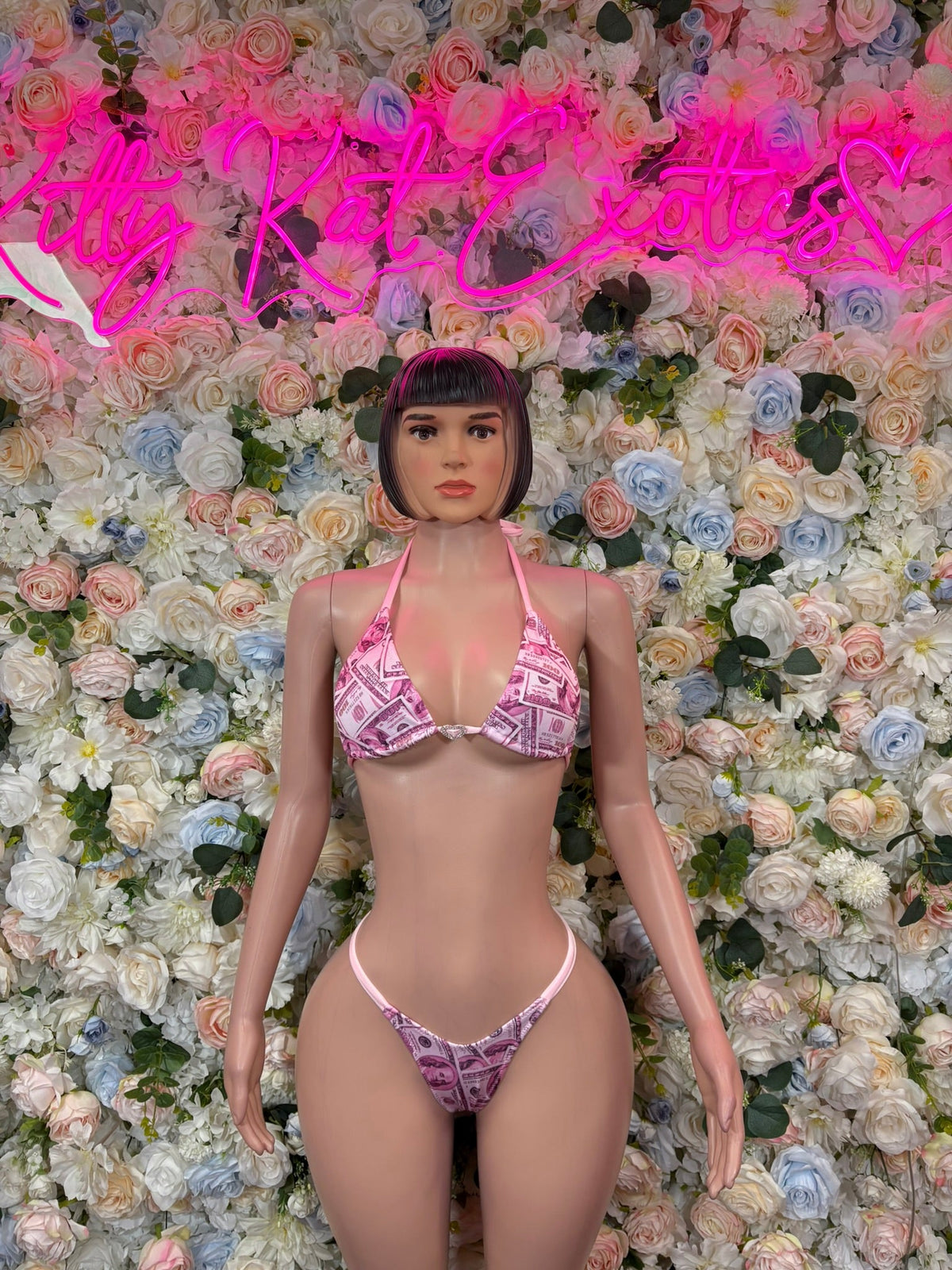 Pink triangle micro bikini set with printed triangle bra and string bikini bottoms