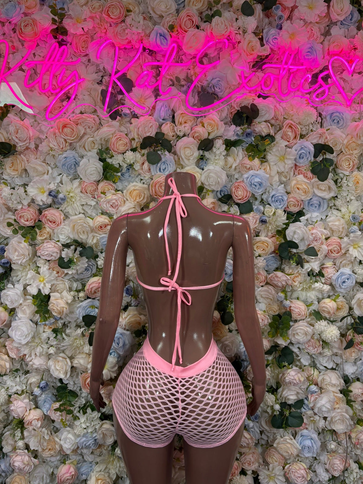 Baby pink halter fishnet shorts set with open back mesh top and matching shorts