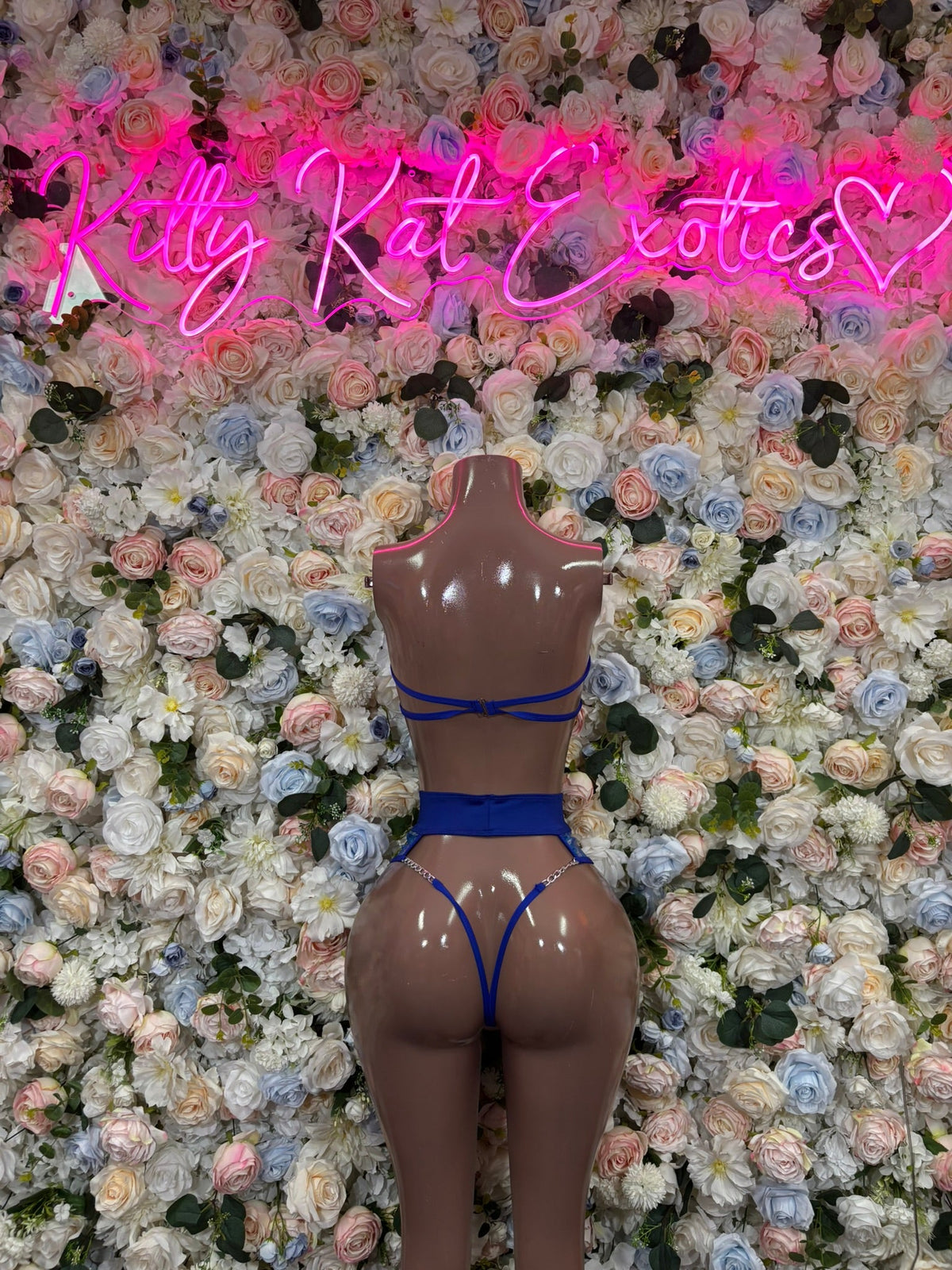 Blue holographic two-piece bikini with triangle top and high-cut briefs, thin straps