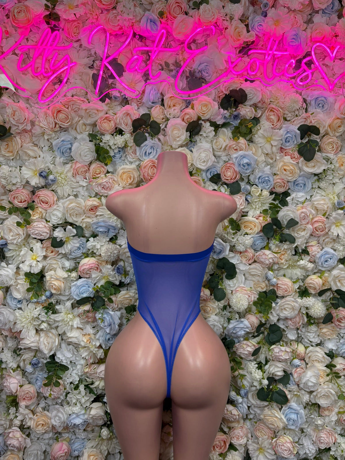Royal blue plunge one-piece swimsuit with open back and high-cut leg