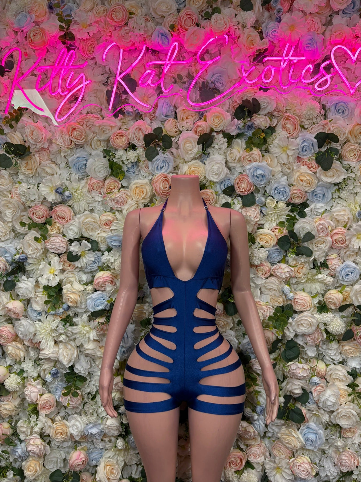 Royal blue strappy cutout bodysuit with curved neckline and front ribbed cutouts