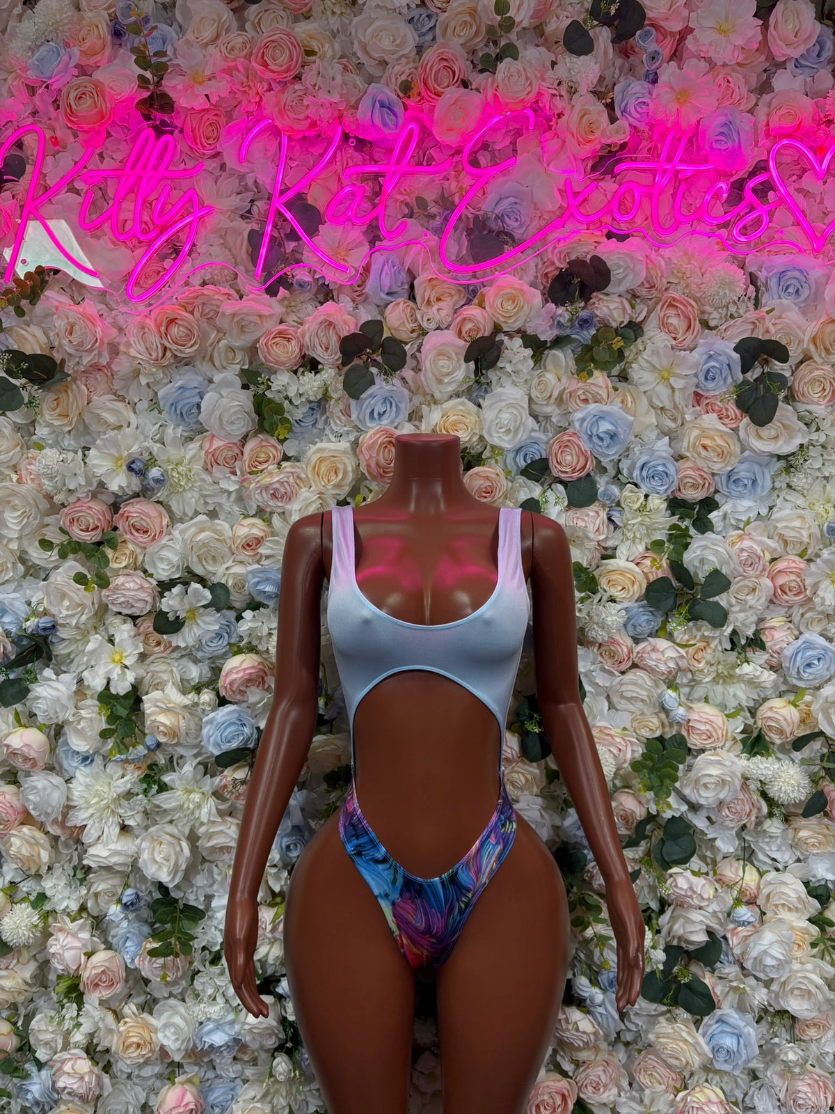 Light blue one-piece swimsuit with multicolor panel, scoop front and thin straps