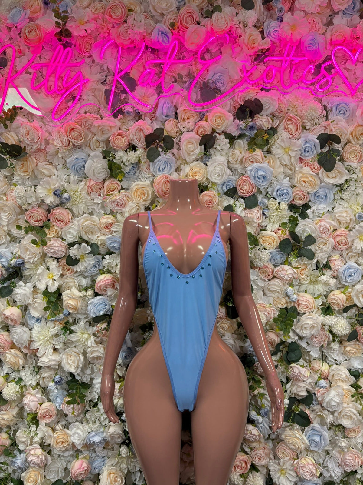 Pale blue one-piece swimsuit, front plunge V with thin shoulder straps