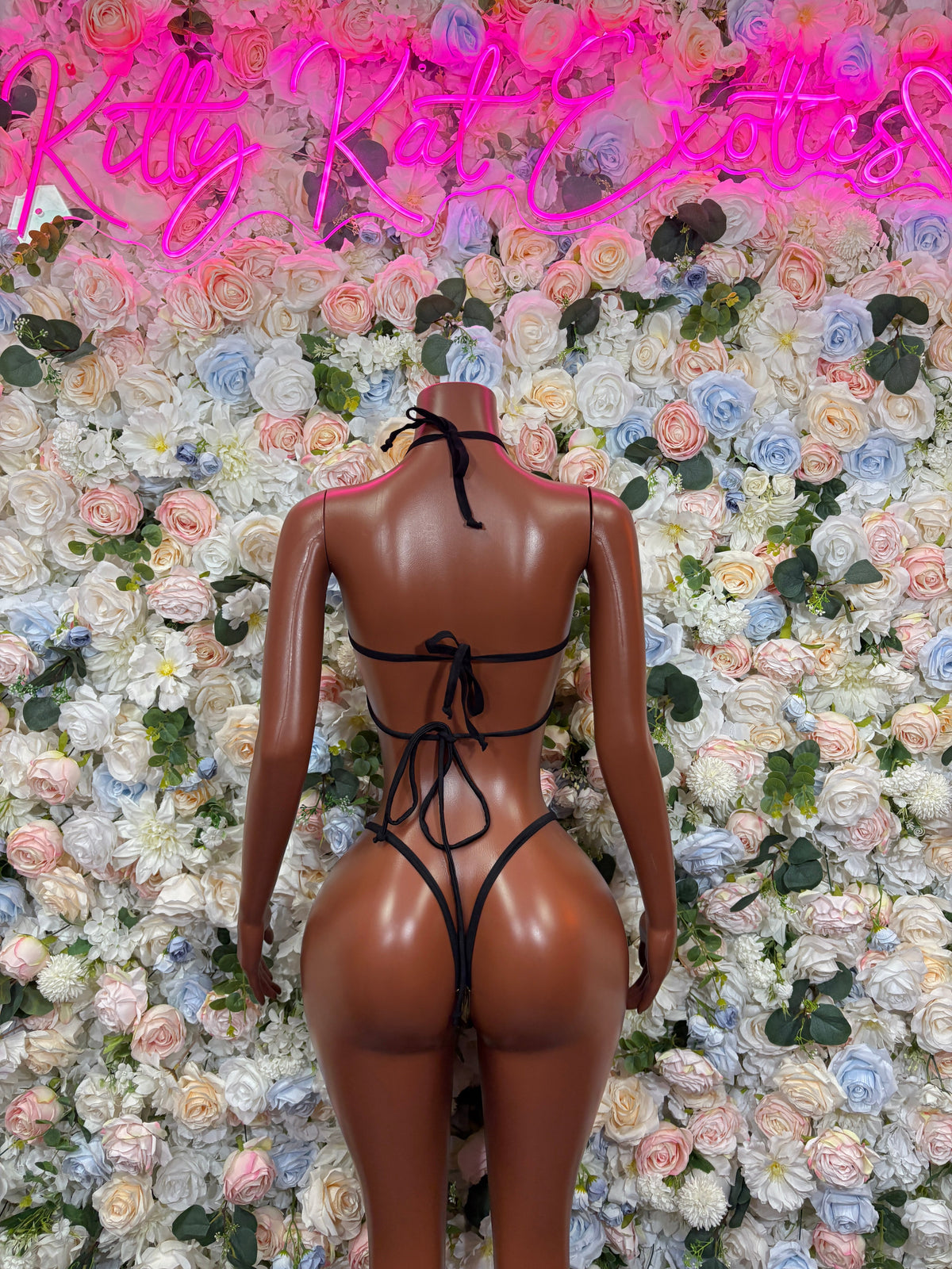 Black ring-strap dance bodysuit with lace-up back and open back design