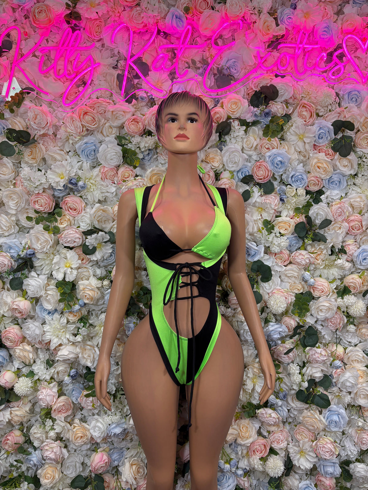 Neon green and black cutout bottle girl bodysuit front view