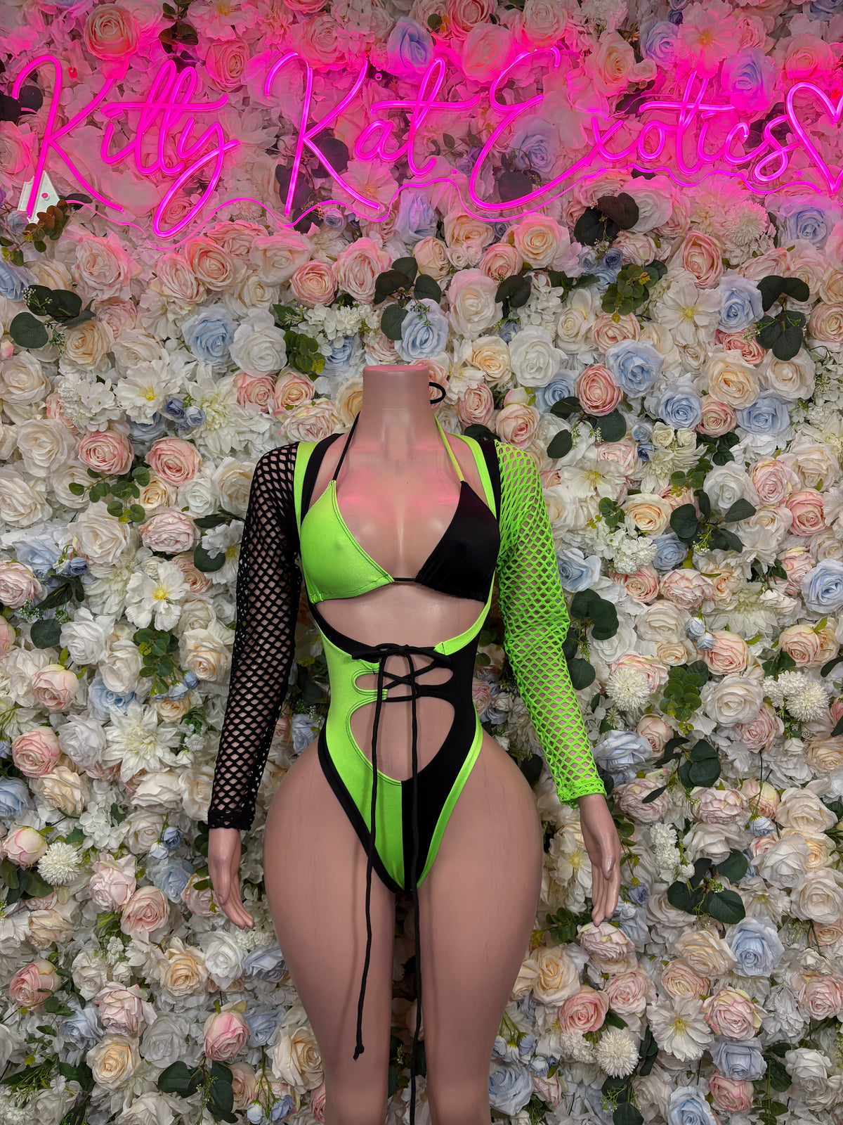 Neon green and black fishnet sleeve bottle girl bodysuit front view