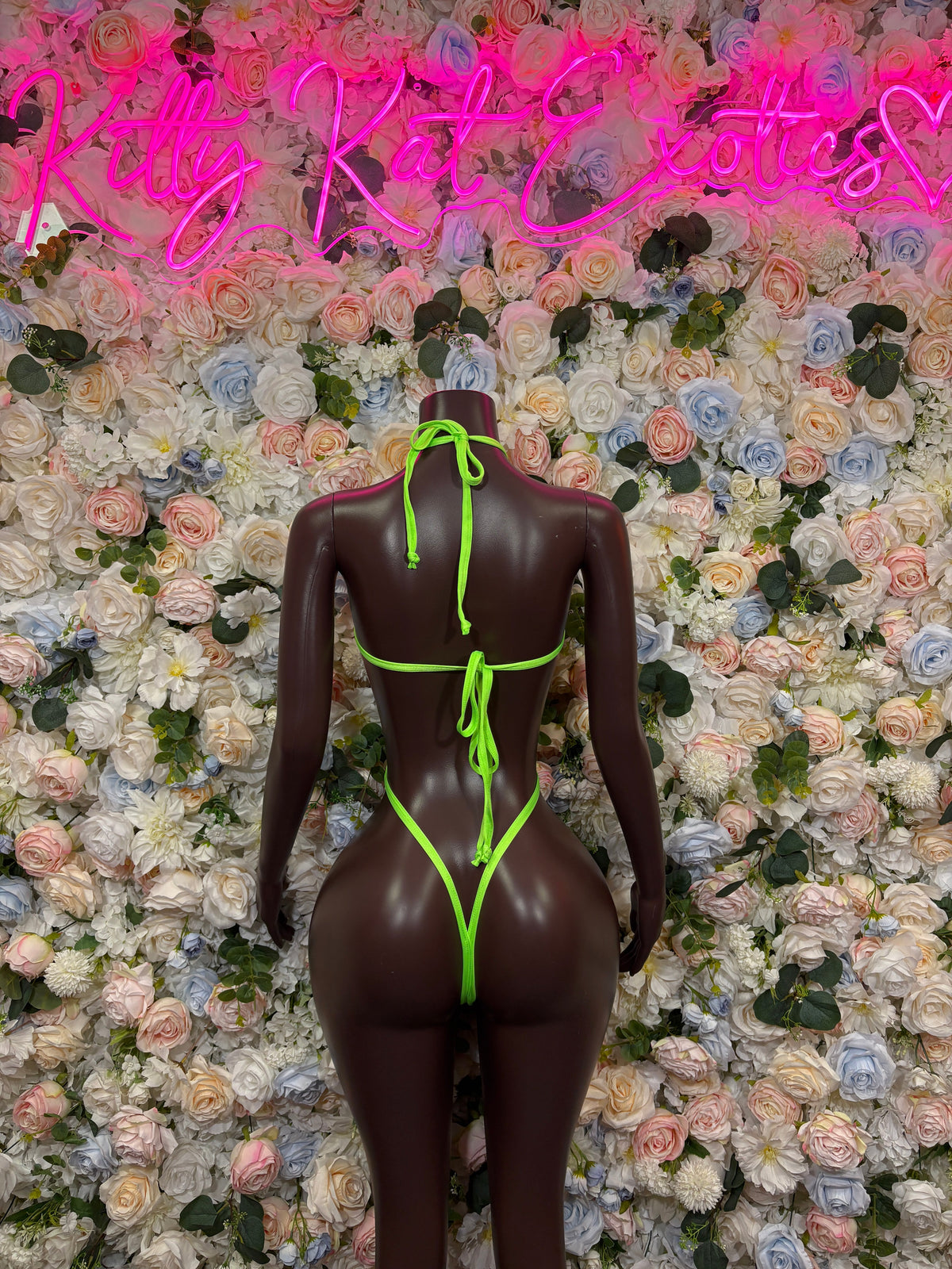 Orange black and neon green cutout rave bodysuit back view