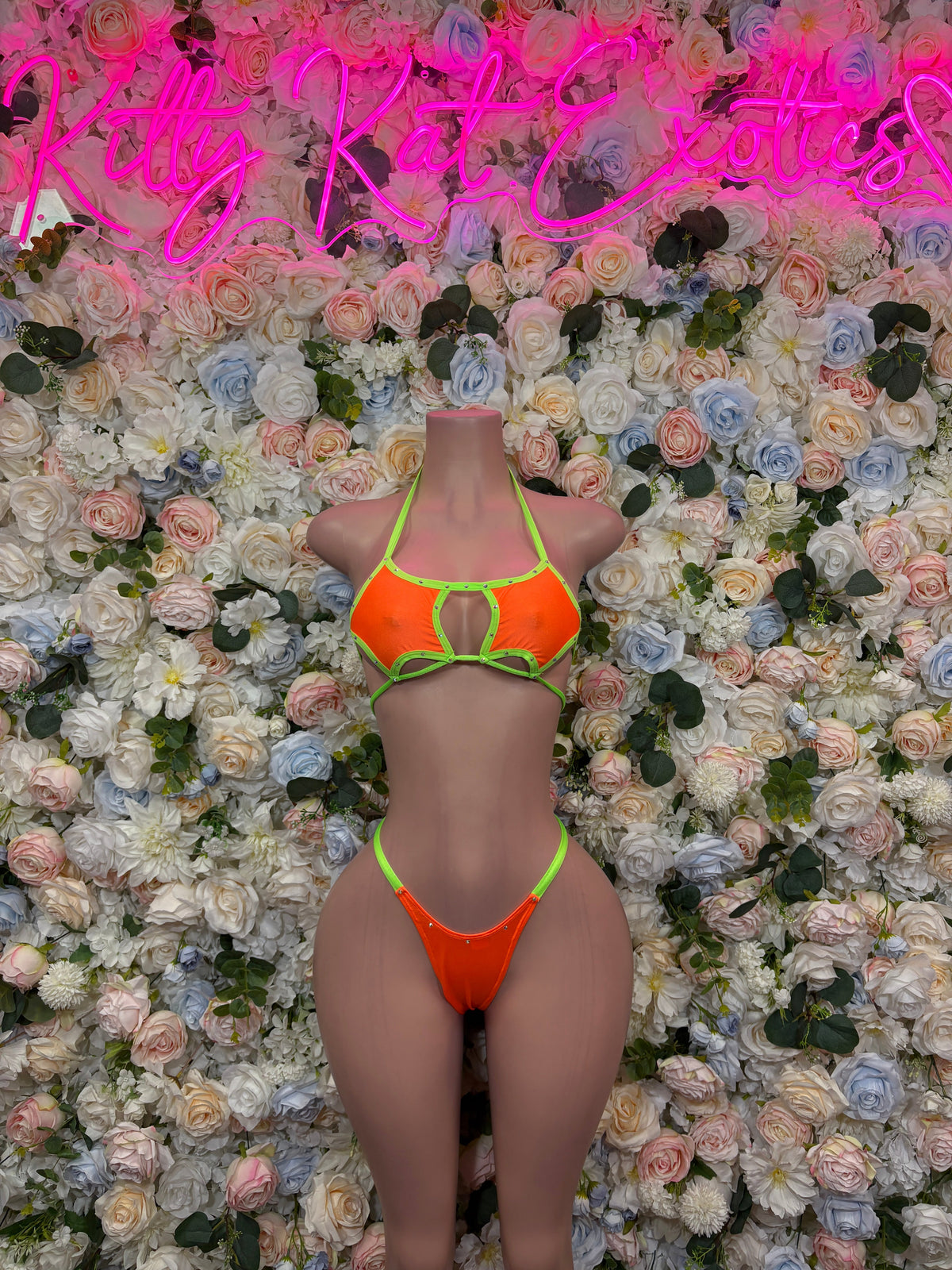 Orange black and neon green panel rave bodysuit front view