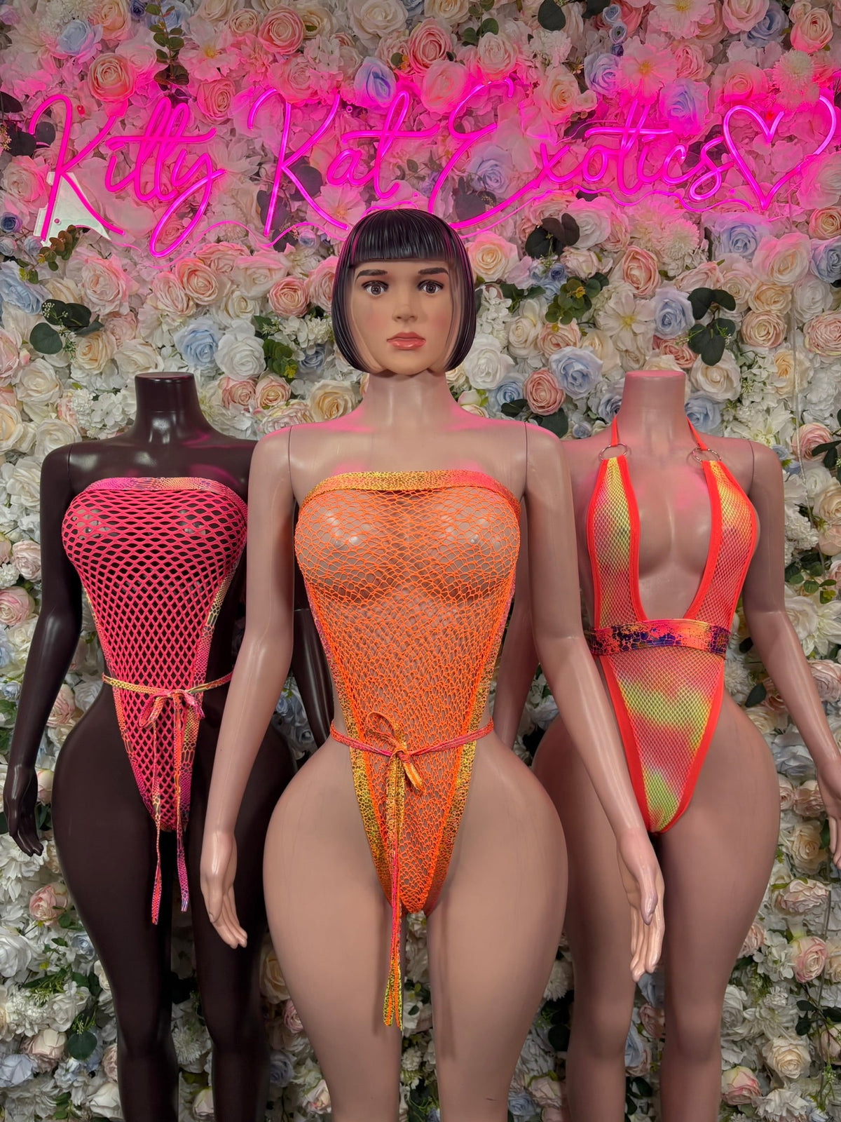 Group photo featuring Pink Fishnet Tie Rave Bodysuit and coordinating KittyKatExotics rave festival styles
